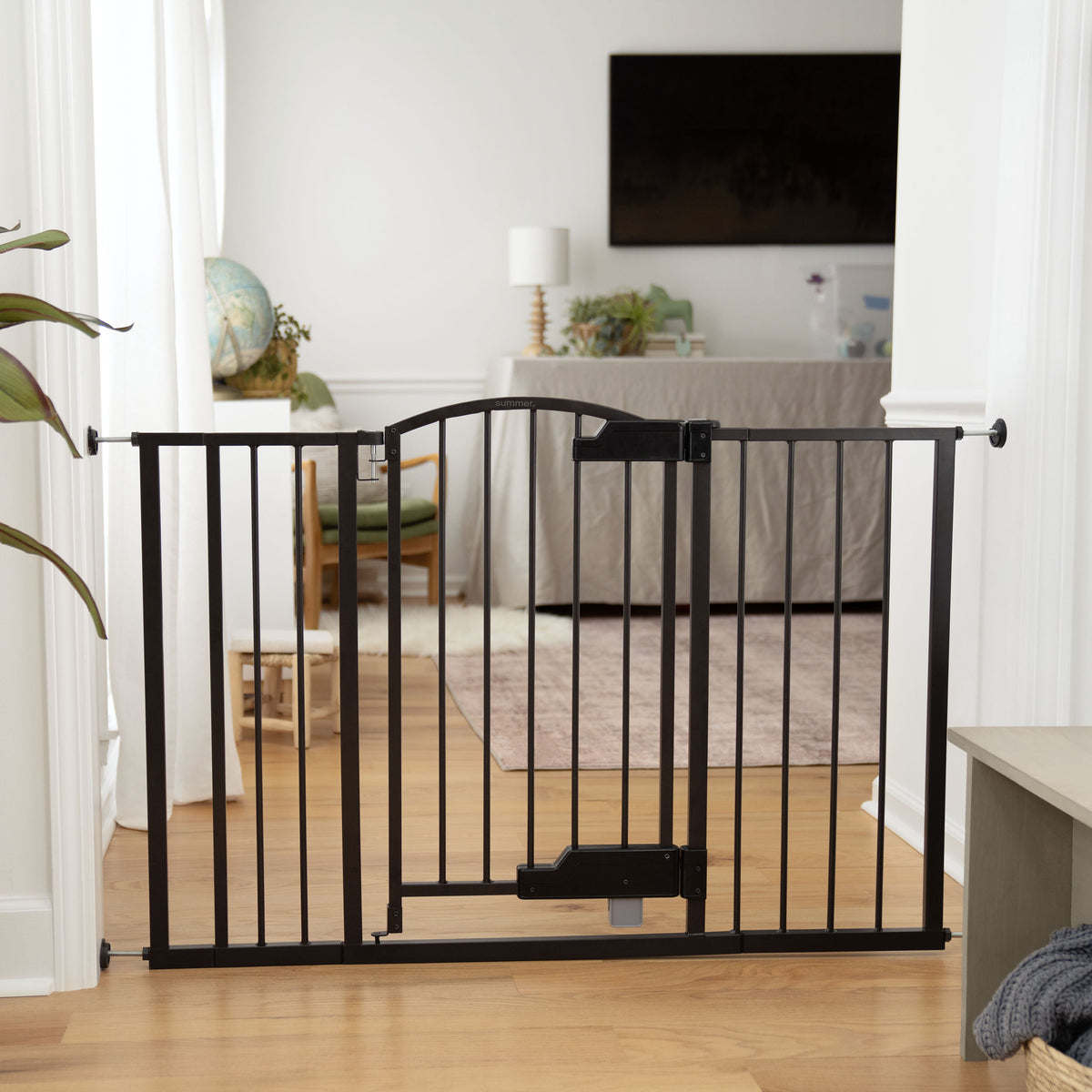 The Thruway 52W Series - Hands Free Open Pet and Baby Gate, Openings from 27.5 - 52 Wide  Espresso Metal